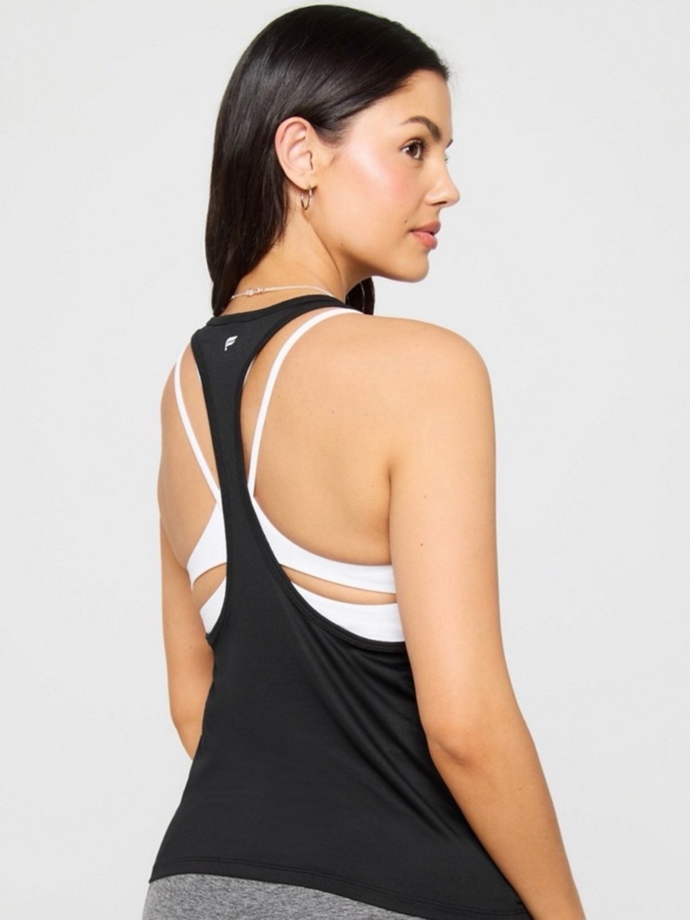 Fabletics Black Racerback Tank with White Care Tag Detail